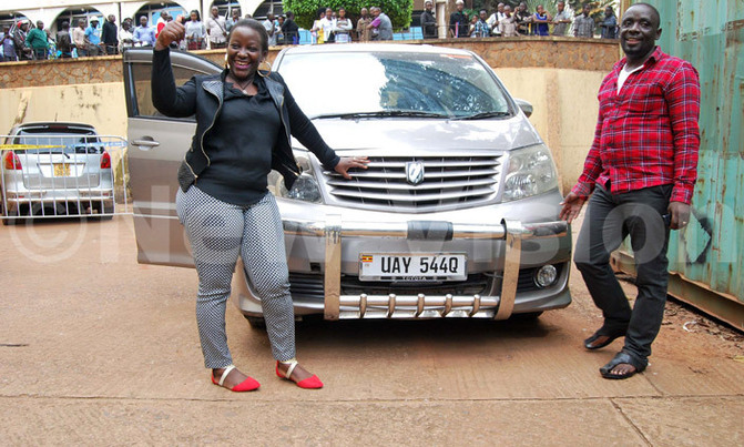 Police hands over recovered car to Lutaaya Police hands over recovered car to Lutaaya
