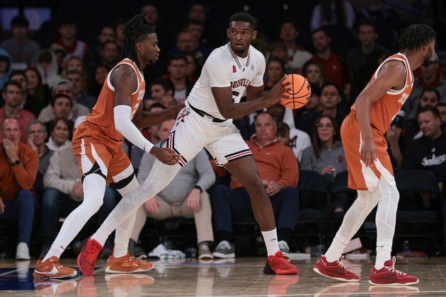 Last-second shot by Max Abmas leads No. 19 Texas over Louisville