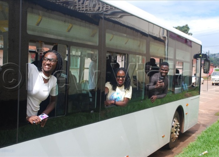 uth asejje and colleagues pose for a photo in the ayoola after a test drive in ecember 2029 joto by awrence ulondo