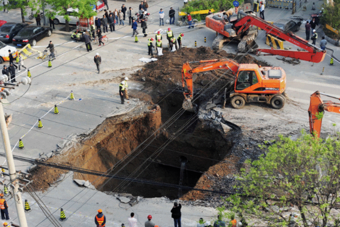 Body of truck driver recovered from sinkhole in Japan