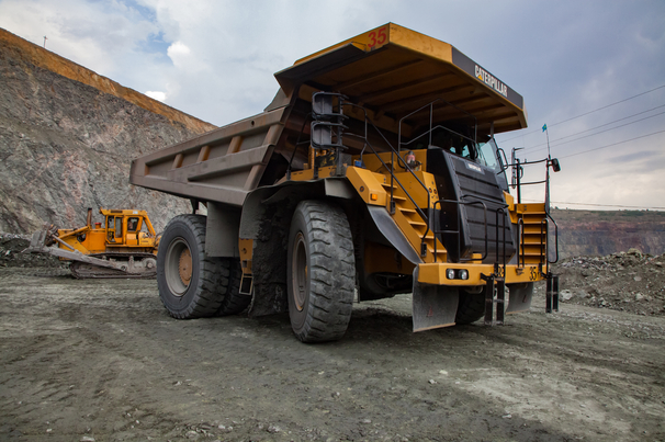 Caterpillar quarry truck transporting iron ore in Kazakhstan