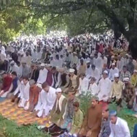 Shia Muslims in Sambhal wear black bands at Eidgah during Eid Namaz