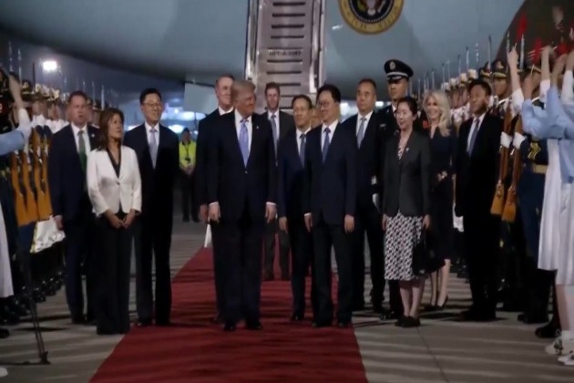 Trump lands in Beijing, accompanied by Nvidia CEO for summit with Xi
