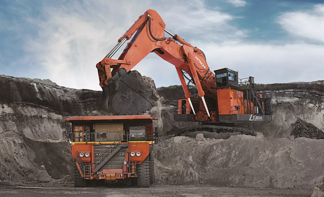 Hitachi Construction Machinery rigid dump truck and ultra-large hydraulic excavator.