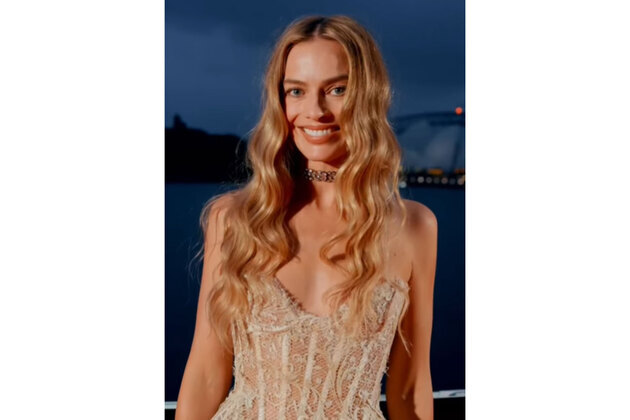 Emerald Fennell says she regrets cutting Margot Robbie's "extremely hairy armpits" scene from 'Wuthering Heights'