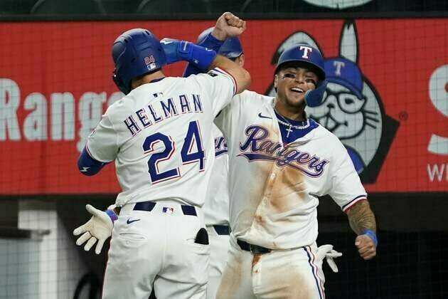 Michael Helman knocks in four as Rangers top Athletics