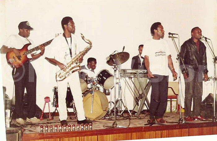 arry wanga left playing bass with the ixed alents xtreme right is band leader ope ukasa next to him is ichael usoke 