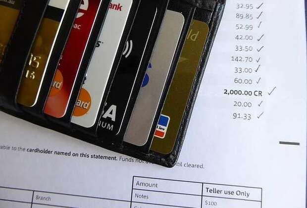 Outstanding credit card debt to hit $1 trillion in 2016: WSJ