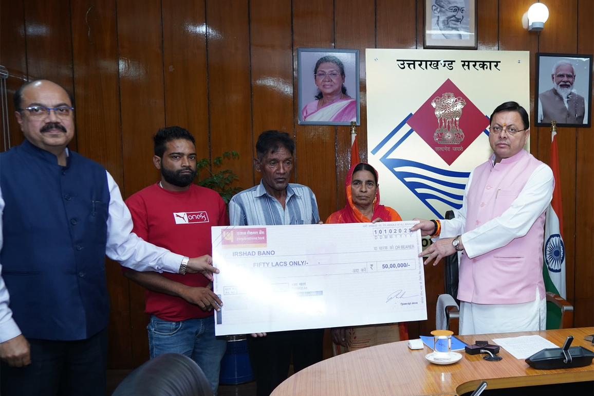 Following deaths of three personnel in separate road accidents, CM Dhami hands over cheques of Rs 50 lakh each to their dependents