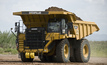 Caterpillar has forecast a higher profit per share but higher restructuring costs too.