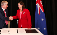 Canada's Tim Hodgson and Australia's Madeleine King. 