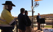  Banjima Traditional Owner Maitland Parker, South Flank project director Simon Thomas and BHP iron ore asset president Edgar Basto listening to Western Australian mines minister Bill Johnston at the opening of a village at South Flank in August 2019. Photo by Karma Barndon.