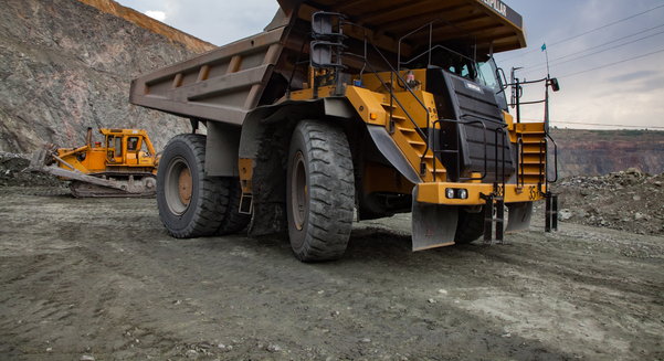 Caterpillar quarry truck transporting iron ore in Kazakhstan