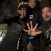 Five trapped people rescued by team from mine in Laos