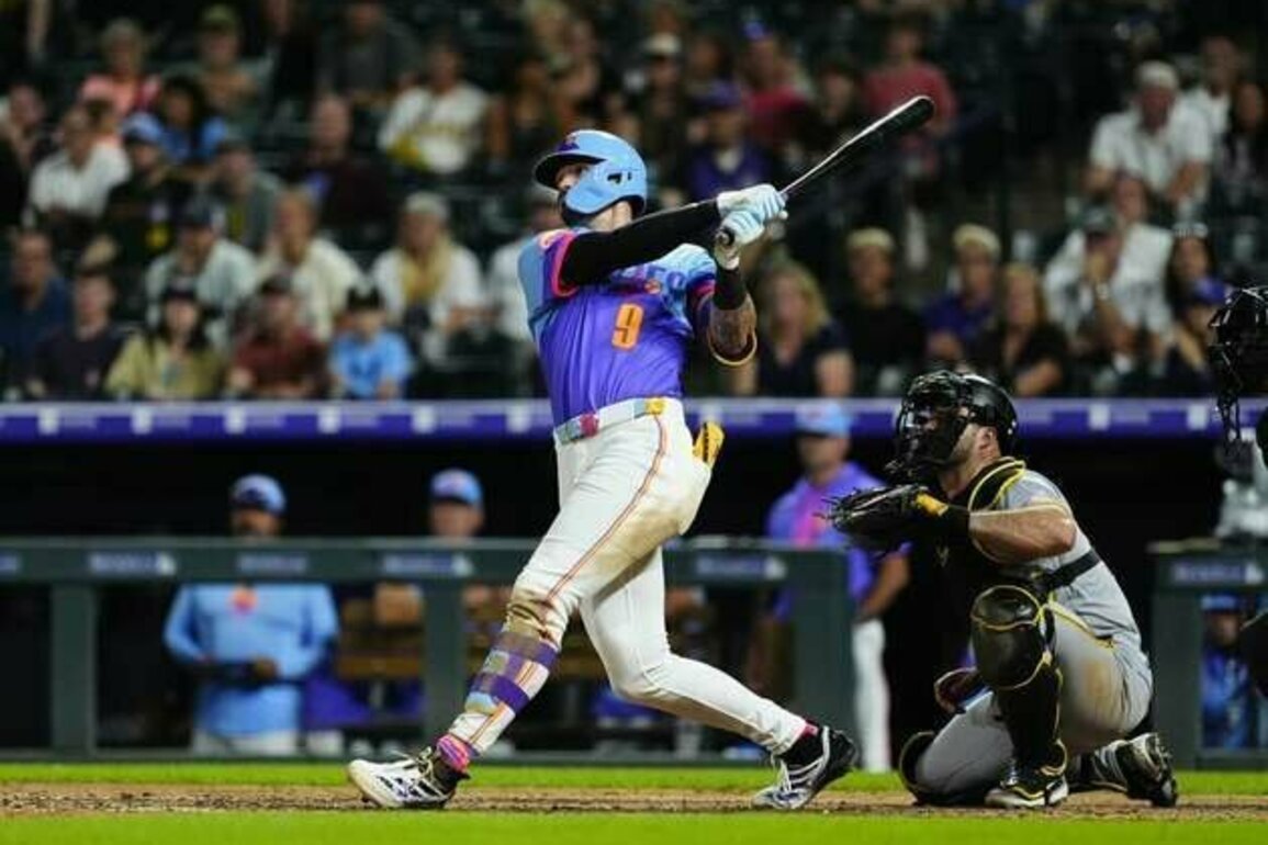 Rockies rally from nine-run hole, stun Pirates 17-16