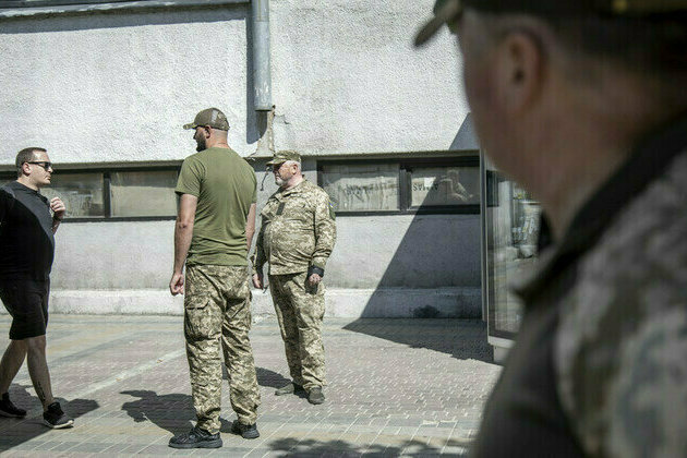 Ukraine catching men like dogs on the street  Putin
