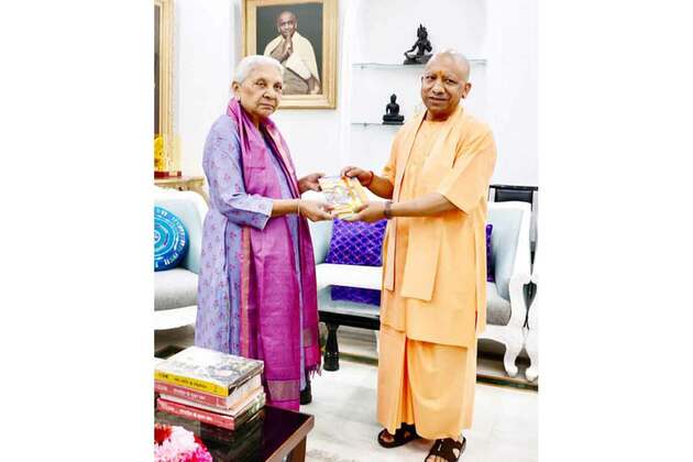 UP CM Yogi Adityanath marks 8 years in office, meets Governor Anandiben Patel