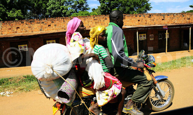 Picture of the day: Boda boda ride along Tirinyi Road Picture of the day: Boda boda ride along Tirinyi Road