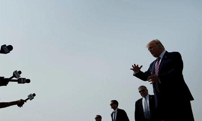 Trump dismisses climate concerns as he visits fire-ravaged western US Trump dismisses climate concerns as he visits fire-ravaged western US