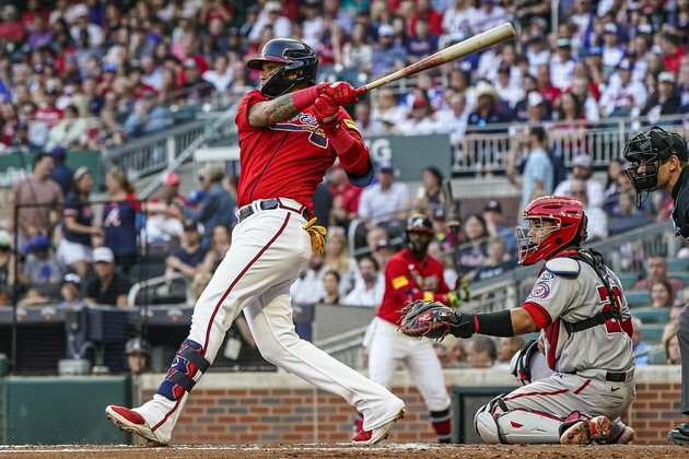 Orlando Arcia a hero again, Braves rally to edge Nationals