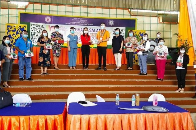 Ozamiz turns over vans, radios to DepEd Ozamiz