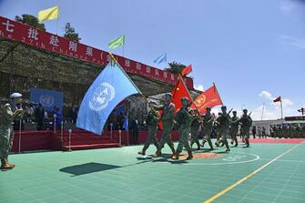 Column: Responsibility over slogan as foundation for China's global peace efforts