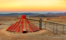 A conveyor belt and stockpile in a copper mine in Chile