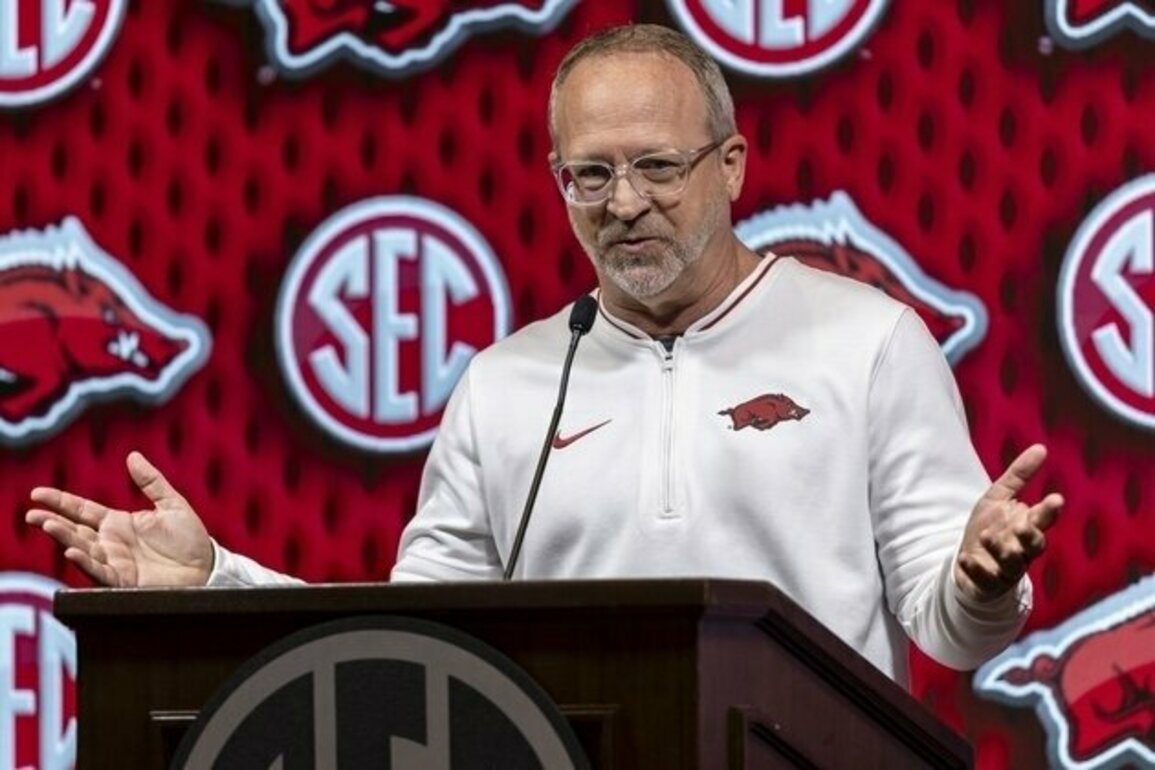 Arkansas coach Mike Neighbors resigns after 8 seasons