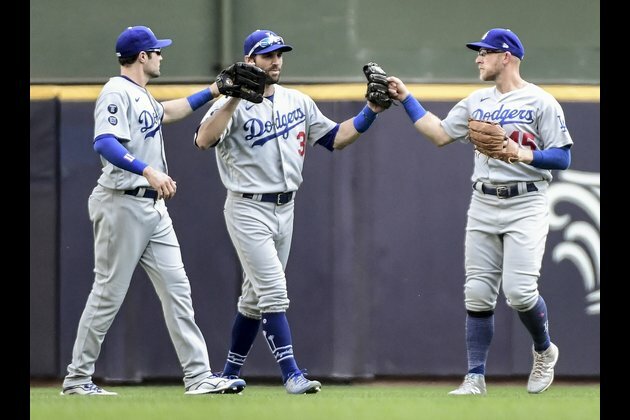 Dodgers seek to build on big day, visit Cubs for 2