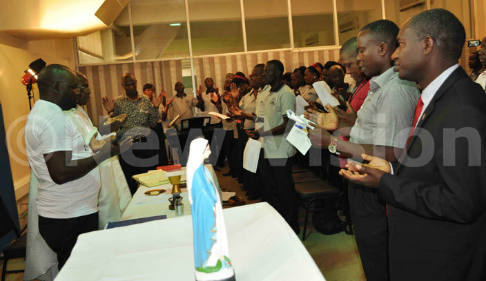  ision roup staff members during the mass at the companys head office 