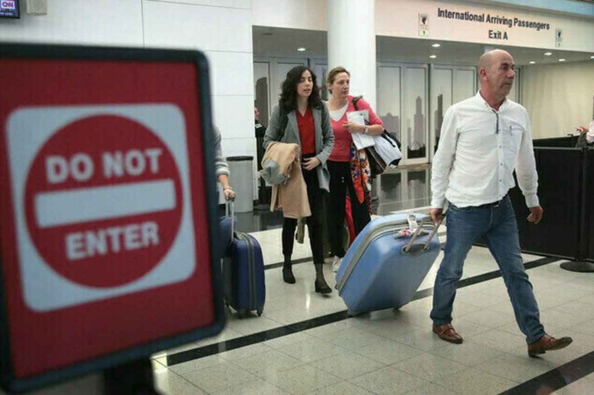 Trump bans citizens of 12 countries from US