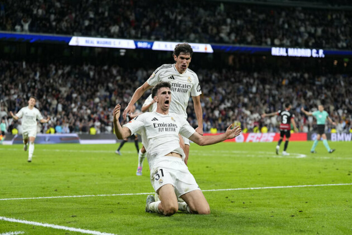 Real Madrid overcome Mallorca and delay Barcelona's title celebrations