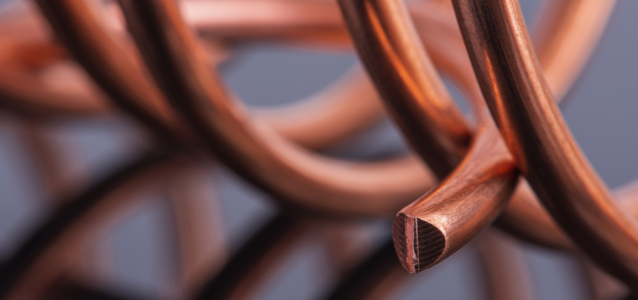 Copper eases after hitting new high