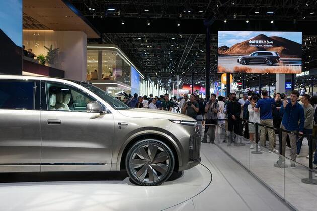 At Beijing auto show, rising fuel costs boost China's NEV opportunity