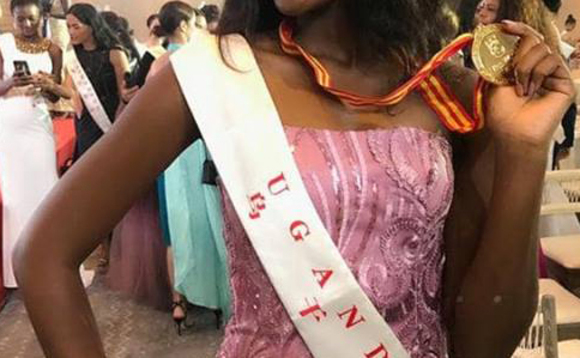 Quiin Abenakyo n'omuddali gwe yawangudde Quiin Abenakyo n'omuddali gwe yawangudde