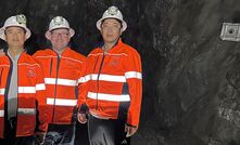 Hellyer Gold Mines chief executive Graham Cox (centre).