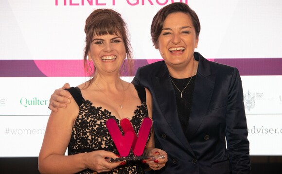Tilney's Eliana Sydes, who was named Financial Adviser of the Year at the inaugural Women in Financial Advice Awards, receives her trophy from the evening's host, comedian Zoe Lyons