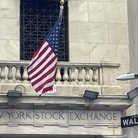 Dow Jones jumps 272 points as Nasdaq Composite dips 34 points