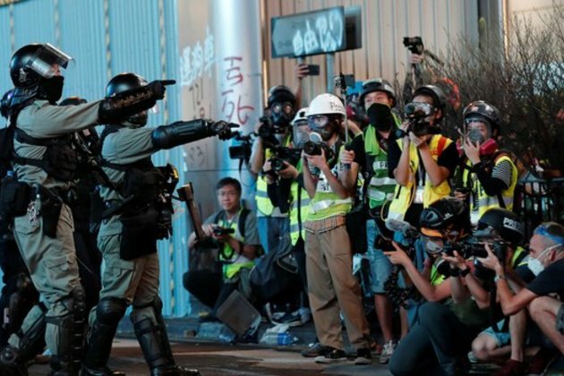Hong Kong Journalists Condemn Police Controls on Press Passes