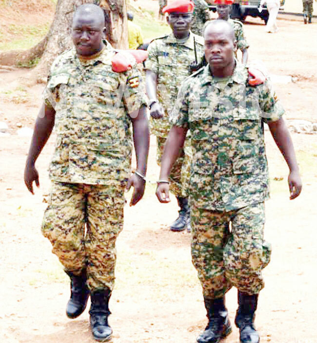 pl eter ushindiki and te obert kurut after appearing before the army court yesterday ourtesy photo