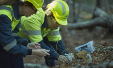 Alcoa environmental research scientists Dr Lucy Commander, left, and Dr Justine Barker set a trap as part of research into trapdoor spiders.