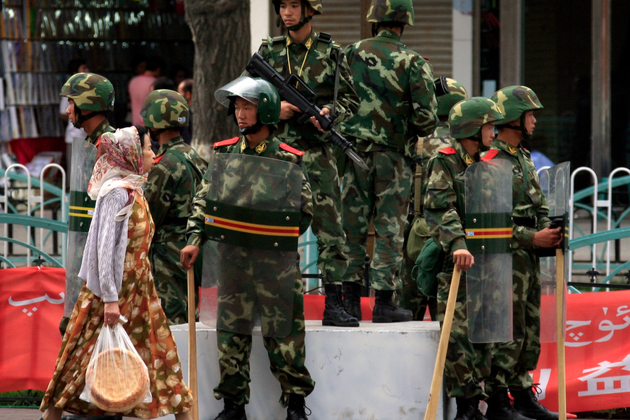 China's Xinjiang tourism push criticised as region faces mass surveillance, detentions
