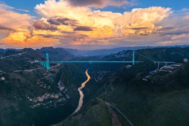 Beyond the steel span -- world's highest bridge uplifting China's mountainous southwest