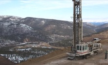 A drill at the crusher area overlooking the expanded camp
