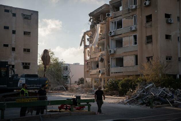 The Latest: Israel, Iran exchange fresh strikes on 9th day of escalating conflict