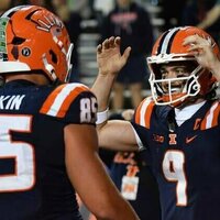 Illinois forces four turnovers, holds off Northwestern in snowy rivalry win