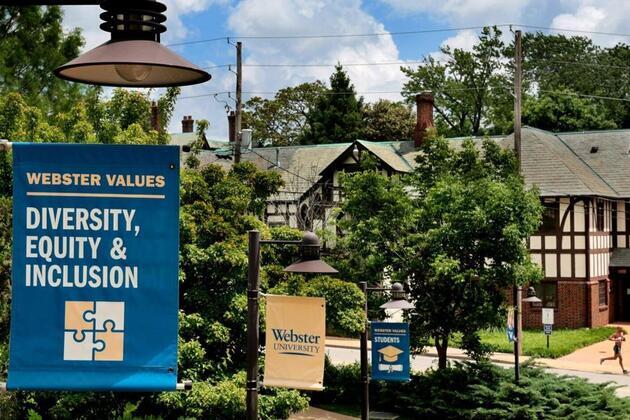 Webster University sells houses and a strip mall