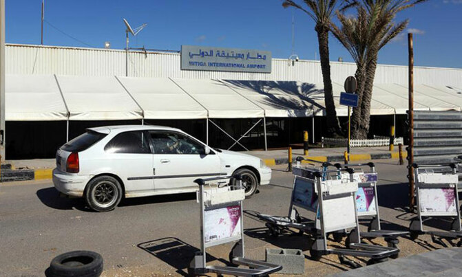 Rocket fire hits Libya airport, breaking Eid truce Rocket fire hits Libya airport, breaking Eid truce