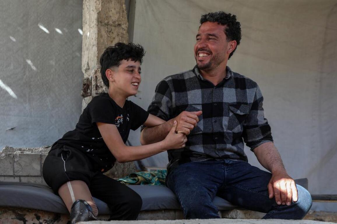 Mideast in Pictures: Wounded and displaced, Gaza's disabled boy struggles to survive