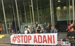 Delays caused by Adani protests are costing Queensland millions of dollars.